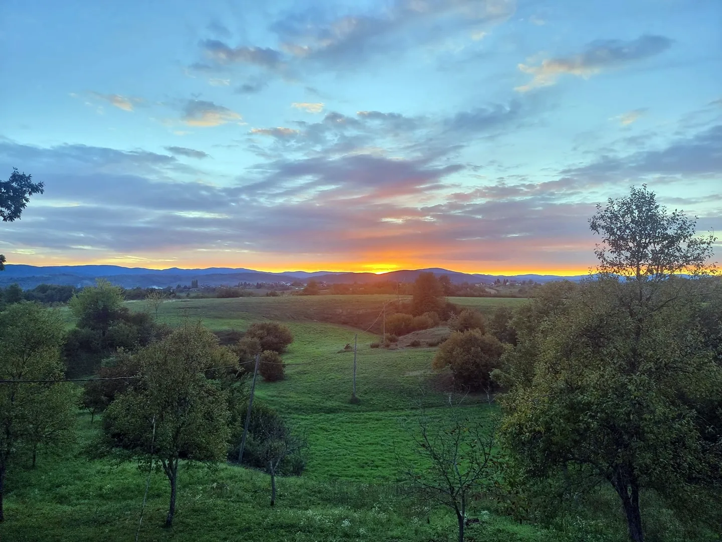 The valley at blue hour with sunset glow